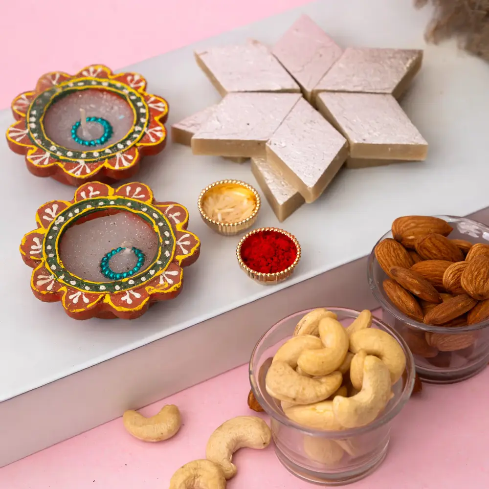 Artistic Candles with Kaju Sweets
