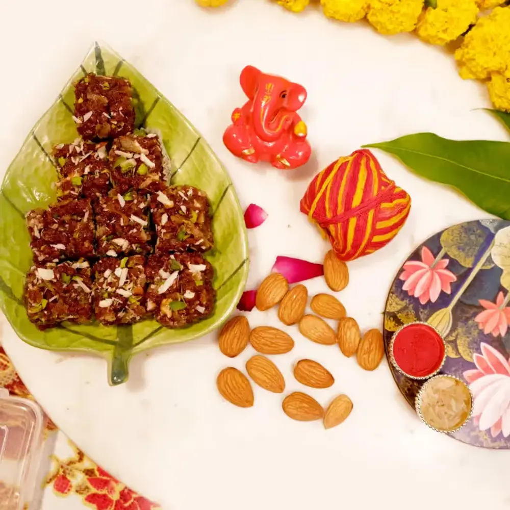 Ganesha, Dodha Burfi, Almonds & Tika