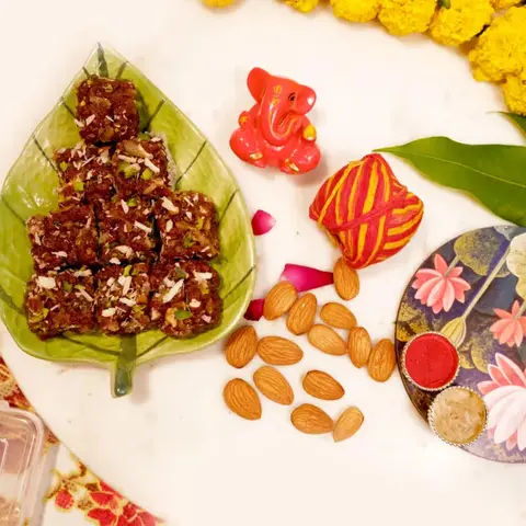 Ganesha, Dodha Burfi, Almonds & Tika