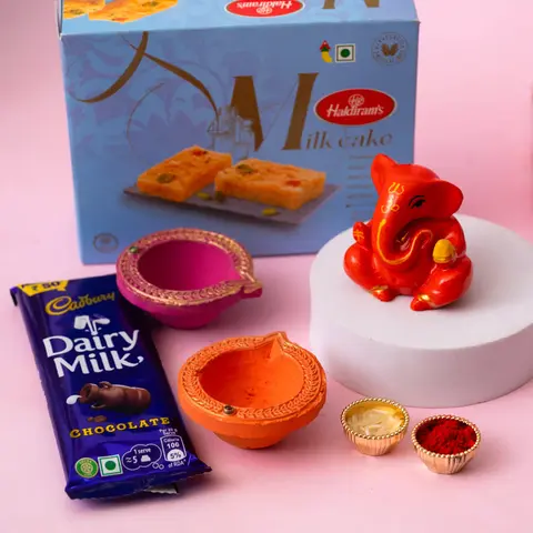 Milk Cake, Ganesha Idol & Diyas