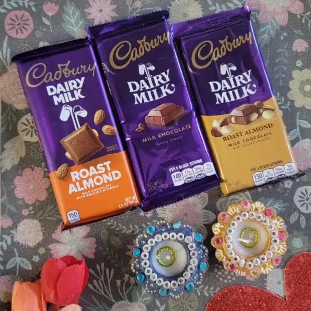 Two Designer Diyas & Three Dairy Milk