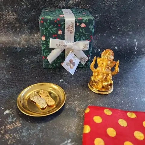 Golden Ganesha Idol & Charan Paduka