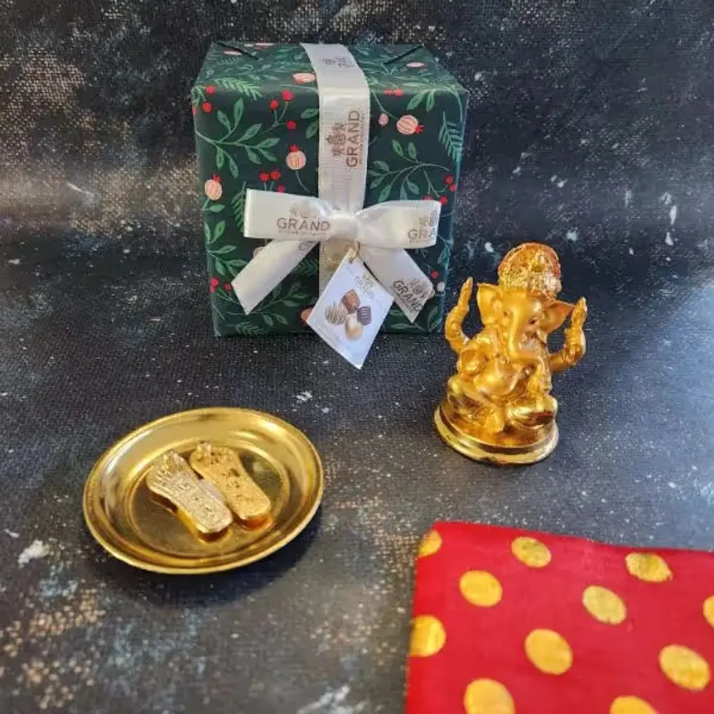 Golden Ganesha Idol & Charan Paduka