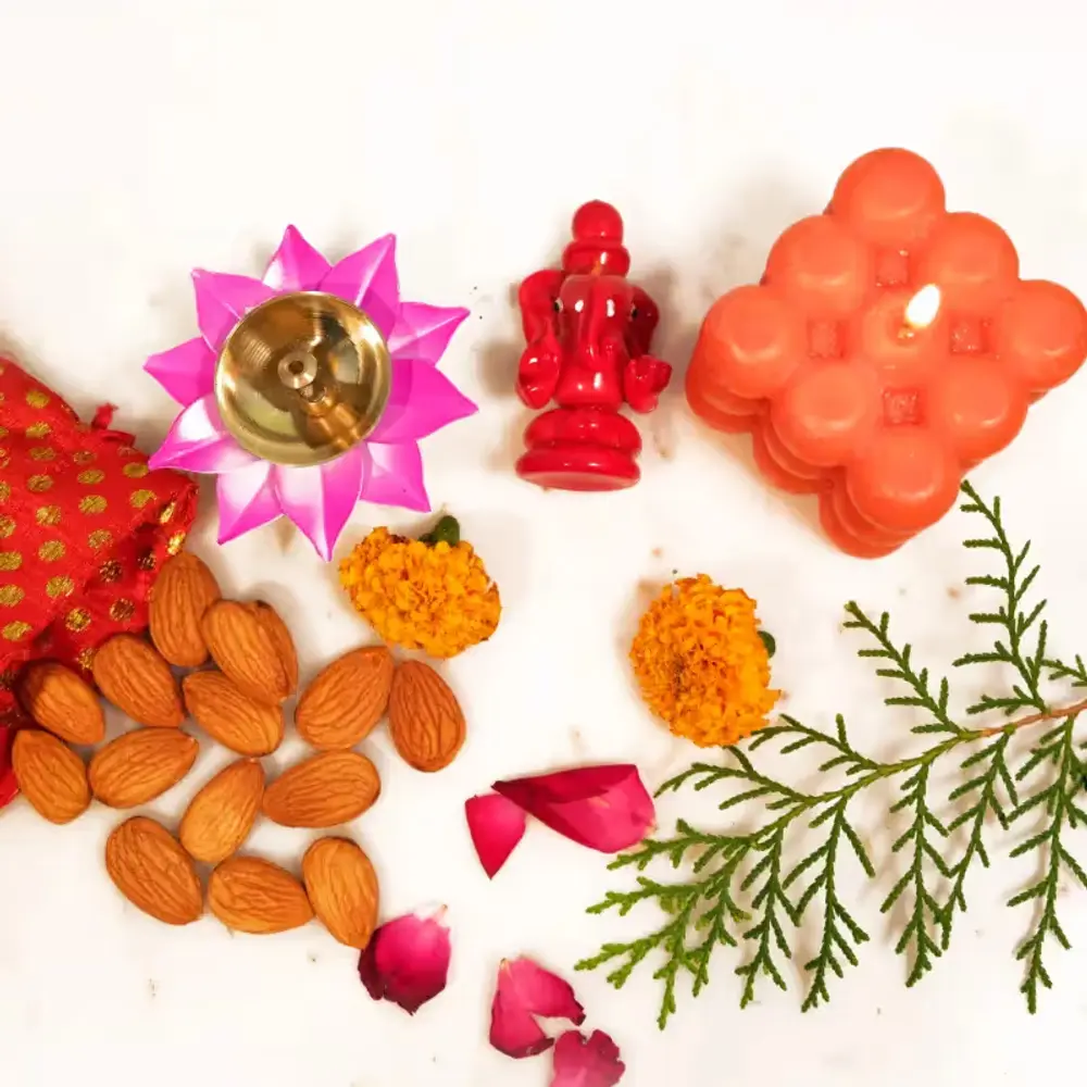 Ganesha Idol, Almonds, Diya & Candle