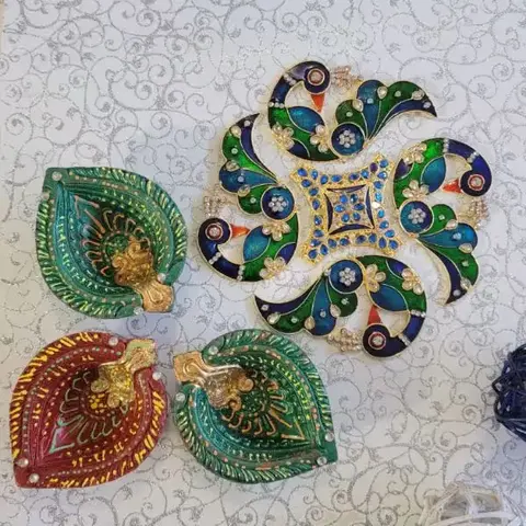 Three Designer Diyas & Diwali Rangoli
