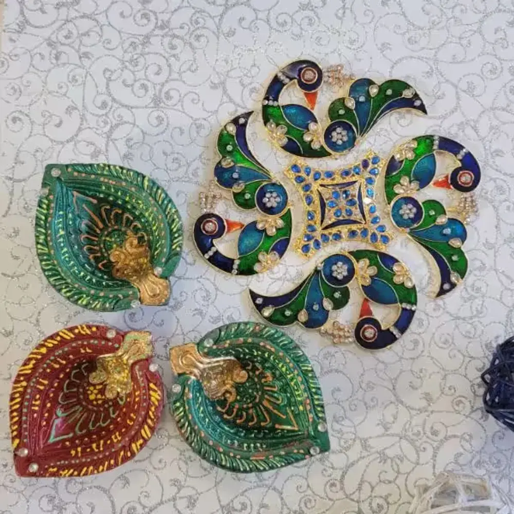 Three Designer Diyas & Diwali Rangoli