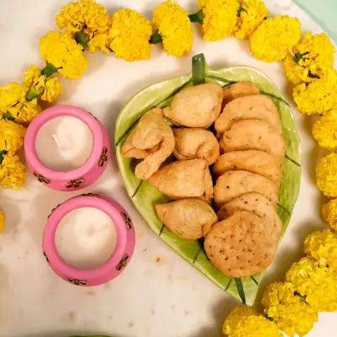 Two Designer Diyas & Savory Snacks
