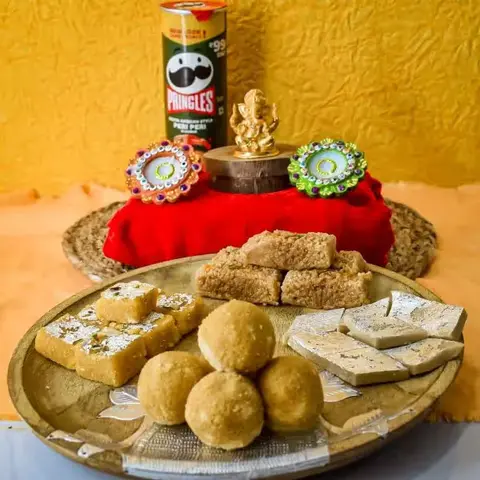 Ganesha, Two Diyas, Sweets & Pringles