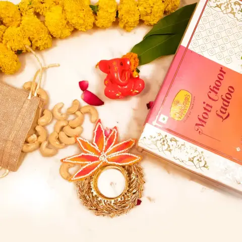 Ganesha Idol, Laddoo, Diya & Cashews
