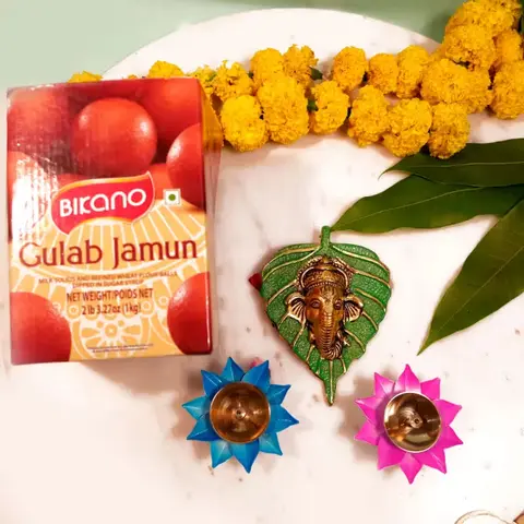 Ganesha Wall Decor, Diyas & Gulab Jamun
