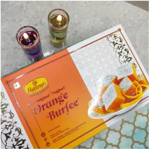 Orange Burfi with Floating Candles