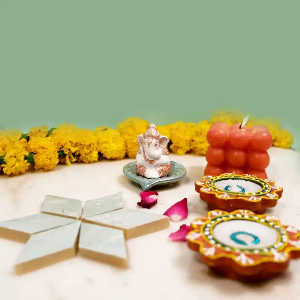 Ganesha Idol, Candle, Diyas & Kaju Katli