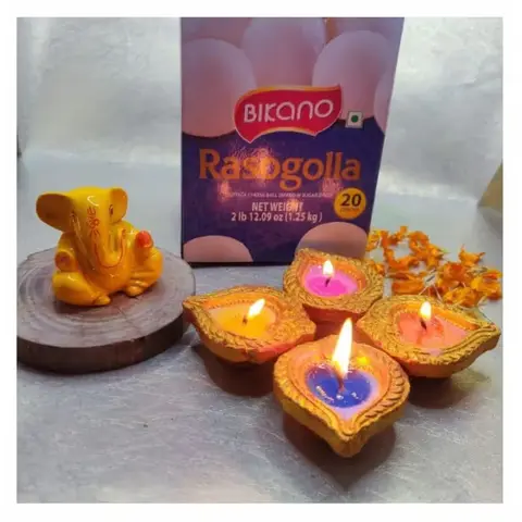 Ganesha Idol, Four Diyas & Rasgulla